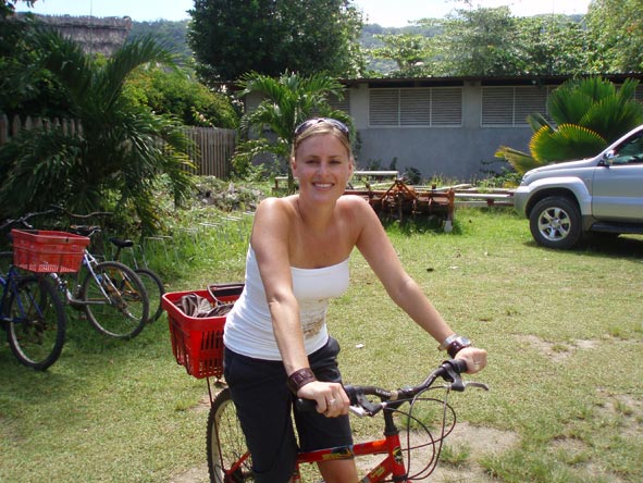 Kate Erskine - riding a bike in the Seychelles